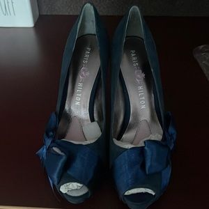 Paris Hilton Navy side bow, pink bottom Heels